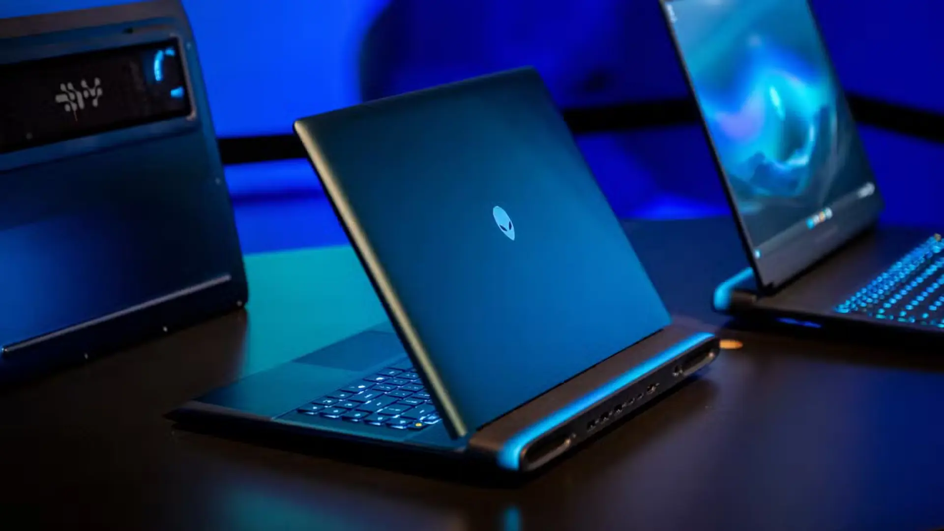 alienware-18-area-51-gaming-laptop-sitting-on-a-table-showing-the-lid-and-ports.webp